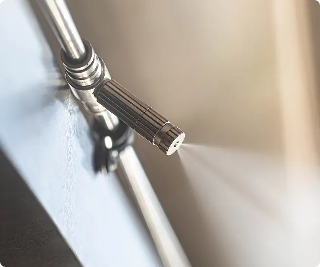 Anti drip misting nozzles for high pressure misting systems